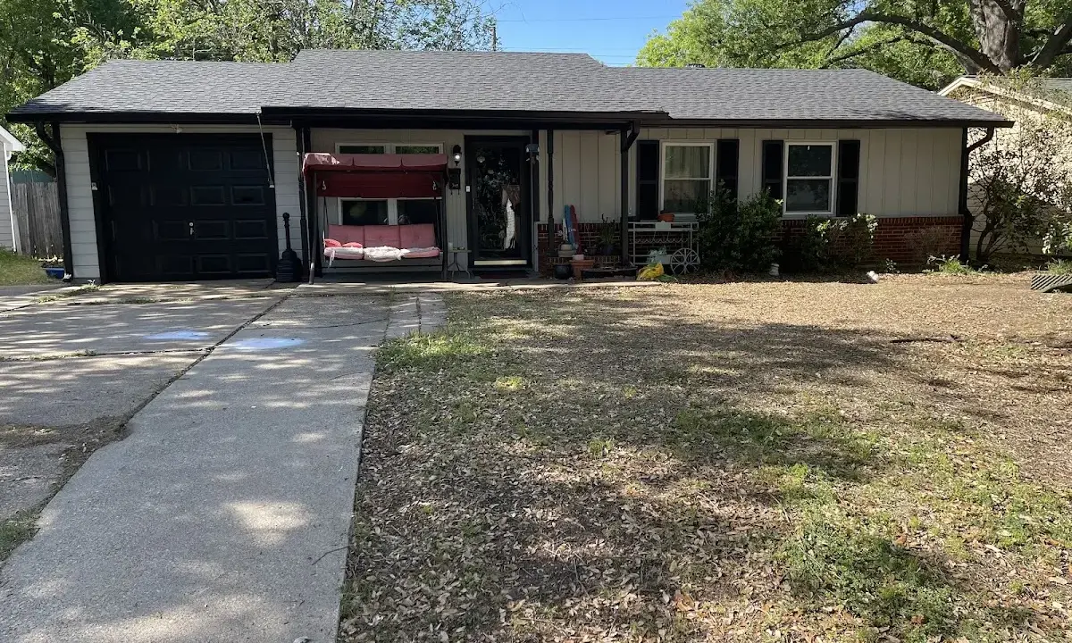 Asphalt Shingle Roof Repair crew at work on a residential roof in Deer Park
